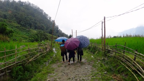 SAPA - H'Mong Guides in the Rain